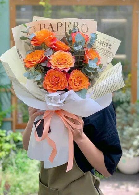 bó hoa hồng cam cháy bùng một tình yêu