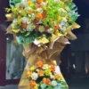 Kệ hoa chúc mừng vàng cam monstera Hướng Tới Đỉnh Cao
