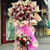 kệ hoa hồng đỏ giấy hồng phấn Phồn Vinh Rực Rỡ