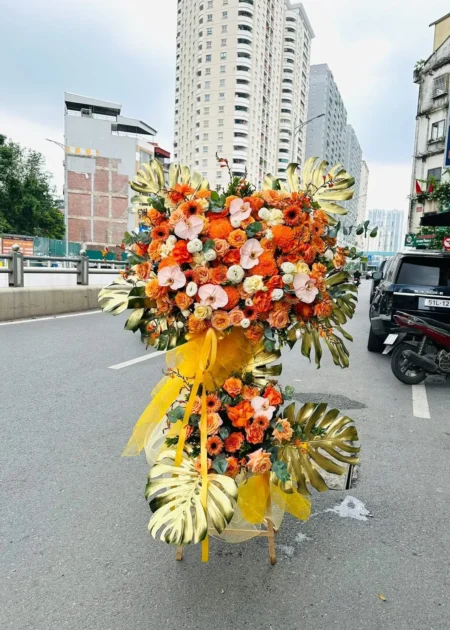kệ hoa khai trương màu cam Hoàng Kim Rạng Danh